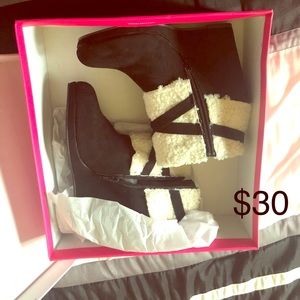 Women’s black and beige booties